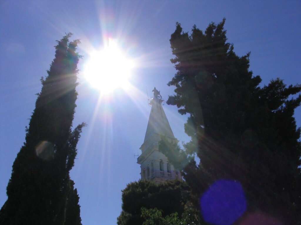 St. Euphemia's church bell tower rising above Rovinj's Old Town rooftops